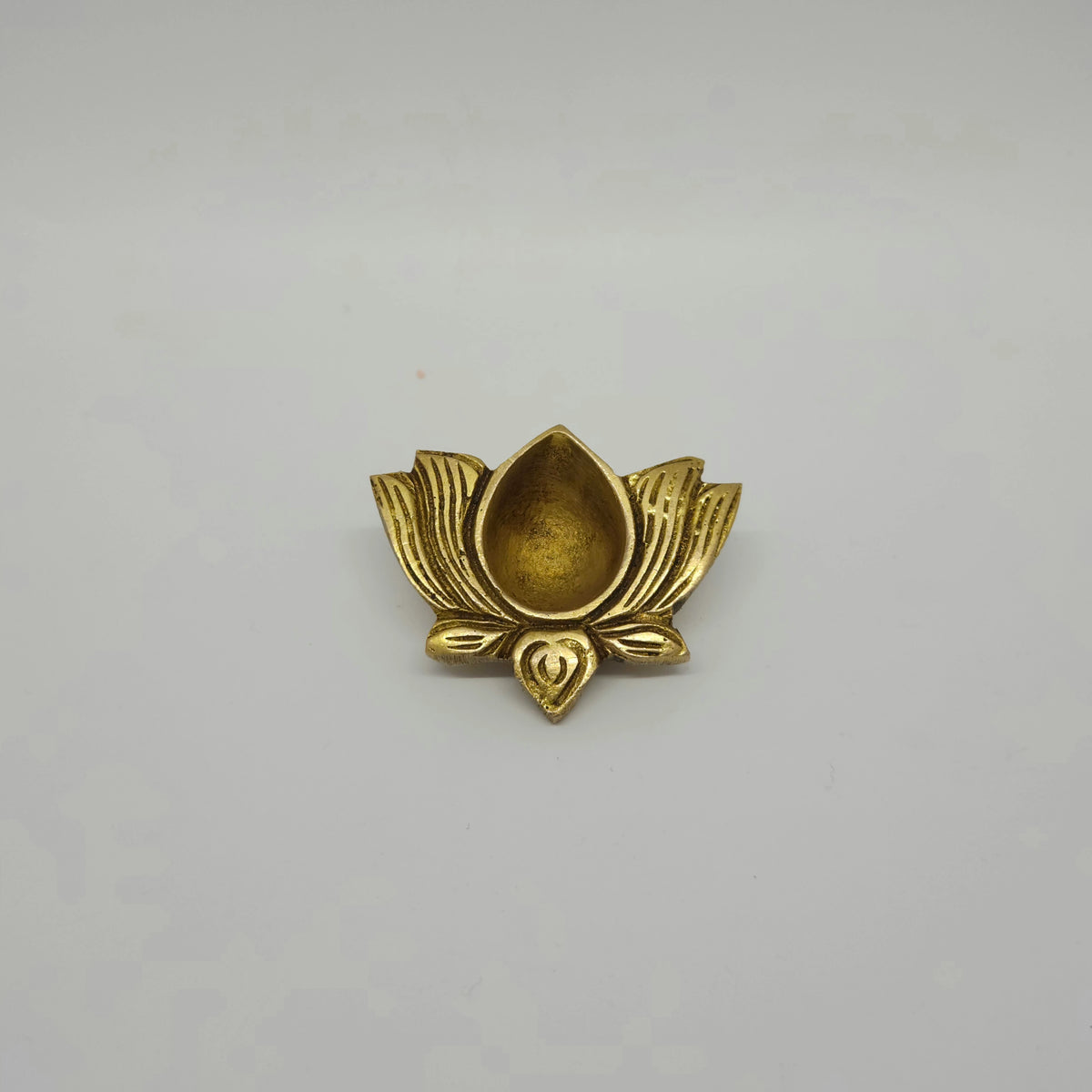 Straight front view of the 5cm small size fine grade solid brass lotus shaped oil deepam.