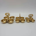Small, medium, and big size variations of the multi-purpose brass peacock 4-cup holder placed side by side.