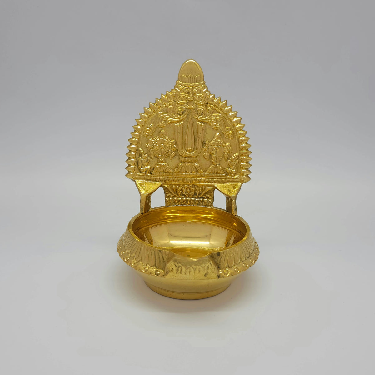 Straight front view of the 15cm brass Perumal Namam Kubera Nalla Vilakku showcasing the deep oil basin and high-gloss polish by Sri Swaminathan and Co.
