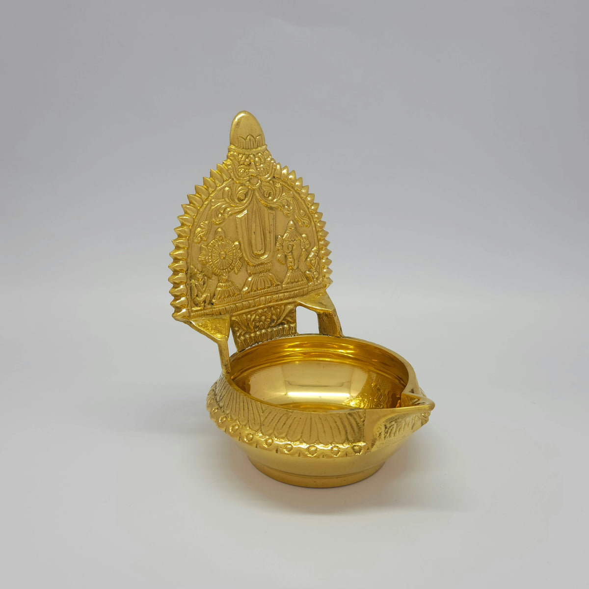 Three-quarter front right perspective view of the brass Perumal Namam deepam highlighting the deep 150ml capacity basin.