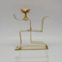 Front view of 7 inch solid brass Swastik diya stand by Sri Swaminathan and Co Kumbakonam showing the single top oil cup and flat base.