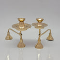Front perspective view of small and big size  of two-tier pure brass camphor arati stands showing the scalloped edges of the lower storage plates