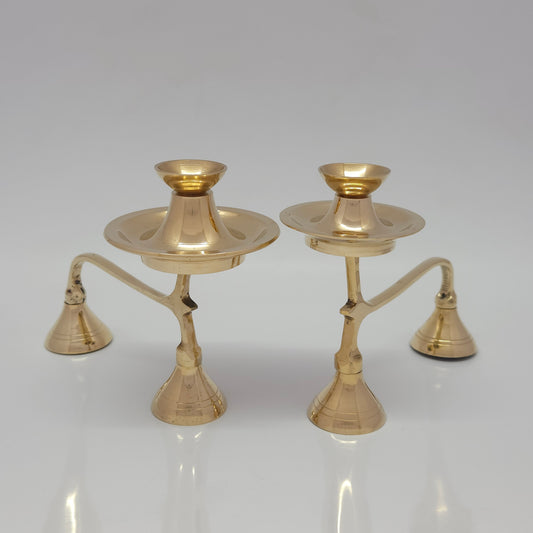 Front perspective view of small and big size  of two-tier pure brass camphor arati stands showing the scalloped edges of the lower storage plates