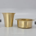 Straight side by side standing view of the eight centimeter high bronze tumbler next to the four centimeter deep dawara cooling bowl.