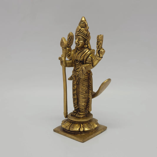 Three-quarter front left perspective view of the fifteen point five centimeter brass Kartikeya statue highlighting the open peacock profile and casting thickness.