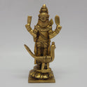 Direct straight back view of the fifteen point five centimeter solid brass Senthil Andavar statue demonstrating the smooth rear finish of his hair and base contours