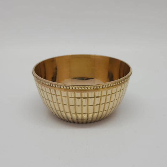 Straight front profile view of the fifty milliliter small brass checked pattern katori cup showcasing the clear texture lines and stepped circular base platform