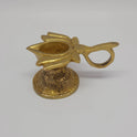 Three-quarter front left perspective view of the four centimeter brass lotus handled lamp highlighting the integrated loop handle and layered petal design