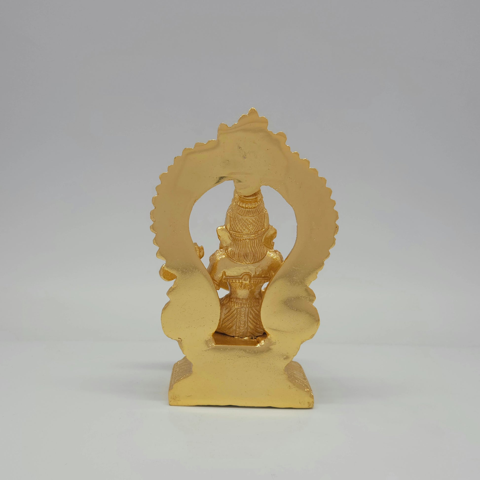 Full back view of the solid 980 grams gold powder-coated brass Saraswati statue showing the clean contours of the reverse archway backing.
