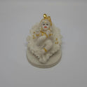 Top-down front view of the independent white resin child Krishna figurine showcasing his peaceful hand-painted facial features.
