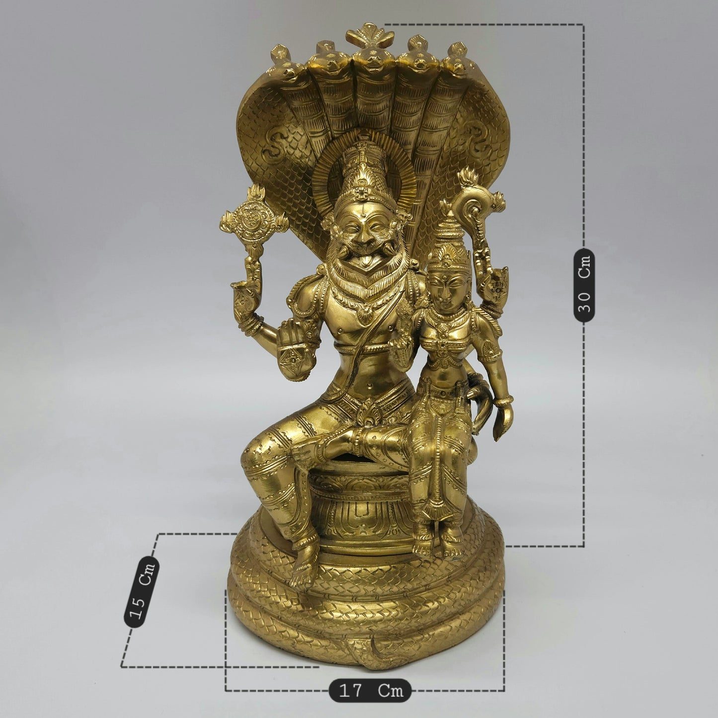 Front dimension chart view of the handmade brass Lakshmi Narasimha Swamy statue showing the exact 30cm height, 17cm length, and 15cm base depth.