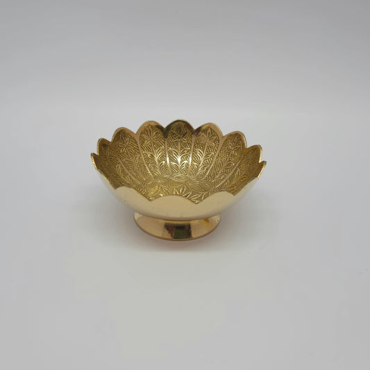 Straight front profile view of a single 9.5cm intricate floral sunflower urli brass bowl showcasing the high-gloss mirror polished pedestal foot base by Sri Swaminathan and Co.