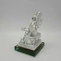 Right side view of the 6.9 inch silver paint resin Ganesha figurine displaying the elegant thickness of the ornate throne back halo.