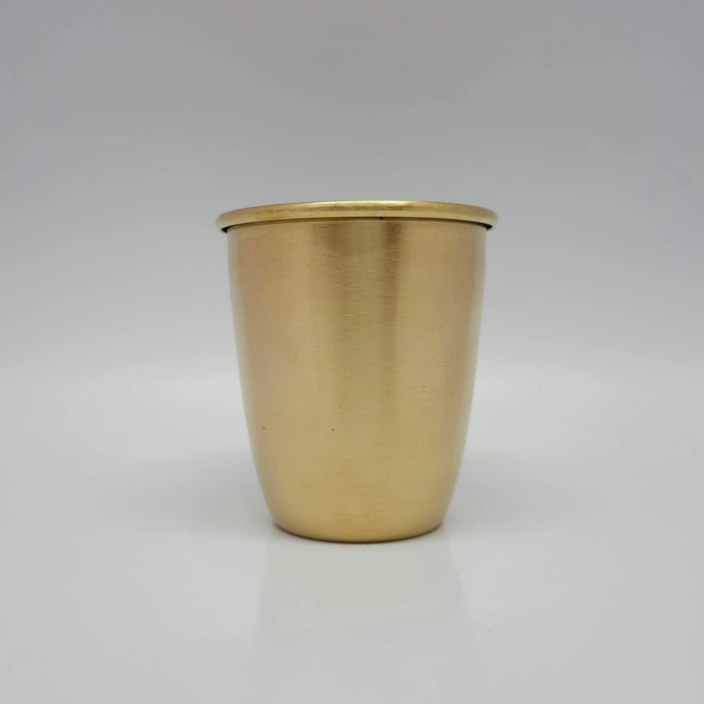 Front view look of the premium matte finish pure brass tumbler for daily home and hotel use.