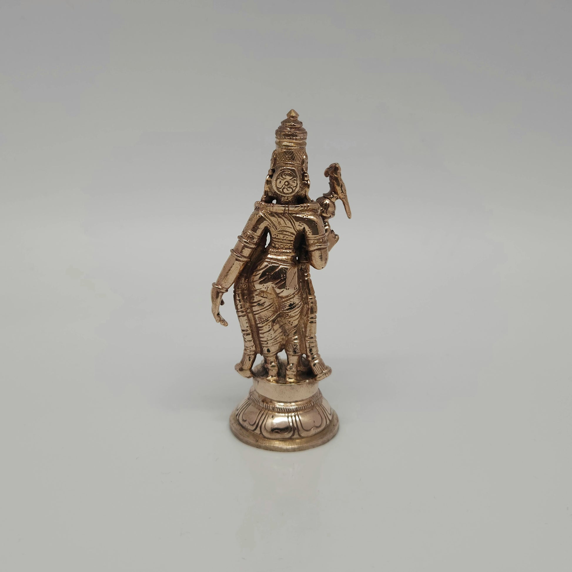 Full back view of the solid 125 grams raw Panchaloha Goddess Meenakshi statue demonstrating the clean metal work and the base circle.