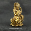 Three-quarter front left perspective view of the solid brass Aishwarya Lakshmi statue highlighting her lengthy hair curls and the deep three-dimensional thickness of the casting.