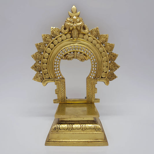 Direct straight front view of the premium solid brass Prabhavali Singhasan throne showcasing the detailed Kirtimukha apex and empty flat deity platform by Sri Swaminathan and Co.
