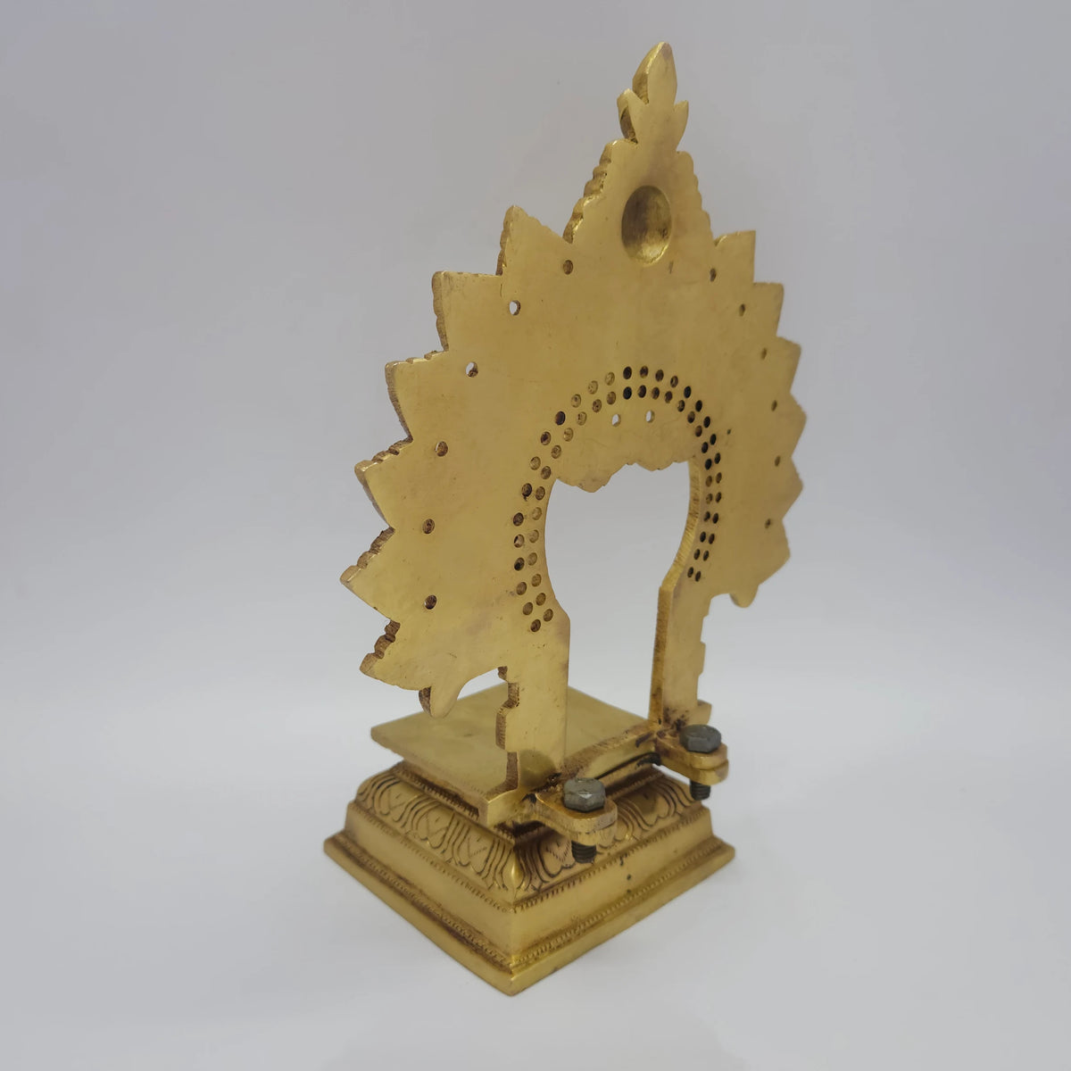 Sharp side profile view of the premium solid brass prabhavali deity throne showing the clear eleven point five centimeter depth clearance and flat reverse base lines
