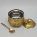 Three-quarter front view of the premium solid brass engraved ghee pot in matte finish shown open with its lid and matching spoon by Sri Swaminathan and Co.
