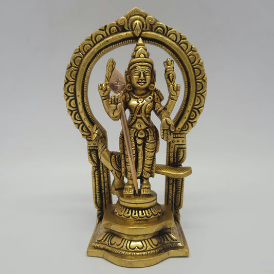 Direct straight front view of the premium solid brass Lord Murugan statue inside an ornate circular Prabhavali archway by Sri Swaminathan and Co.
