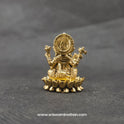 Direct straight back view of the one inch solid brass Ganesha statue demonstrating the detailed rear surface of the sunburst halo crown armor and back contours of the round lotus seat.