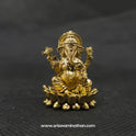  Straight front view of the one inch premium brass Ganesha statue showing the Lord and Mooshikan seated together on a double-bloomed round lotus peedam base by Sri Swaminathan and Co.