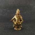 Direct straight back view of the solid brass seated Swami Ayyappan statue demonstrating the detailed rear surface of his royal crown and back contours of the meditative seat