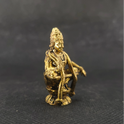 Three-quarter front left perspective view of the brass Swami Ayyappan statue highlighting his layered jewelry garlands and the deep three-dimensional thickness of the solid casting