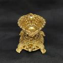 Straight front view of the premium solid brass Tortoise vilakku deepam lamp showing the ornate oil bowl supported on the tortoise shell by Sri Swaminathan and Co.