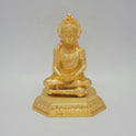 Alternative front profile view of the premium gold coated meditating Lord Hanuman statue highlighting the natural bright white light glints reflecting off the glossy golden mirror finish.