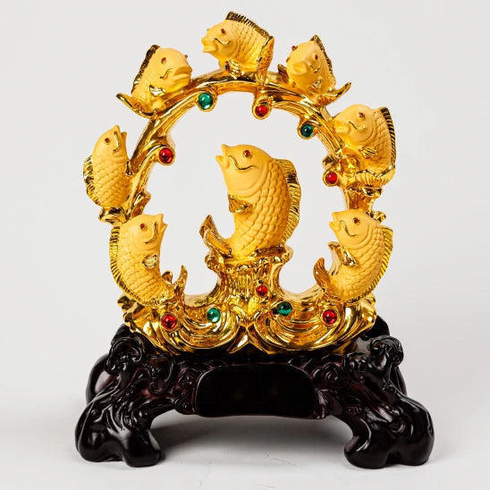 33cm premium luxury gold paint finish resin Feng Shui seven carps archway statue leaping over water waves with red and green gems on a dark base by Sri Swaminathan and Co.