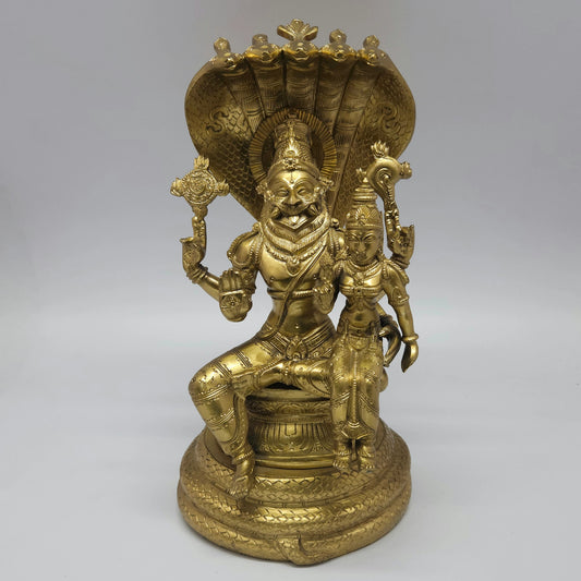 Front view of a 30cm premium handmade solid cast brass Lord Lakshmi Narasimha Swamy statue seated under the Adisesha serpent canopy by Sri Swaminathan and Co.