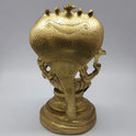 Full back view of the solid 8.2 kg lacquer polished brass Narasimha statue showing the textured rear side of the large Adisesha serpent hood
