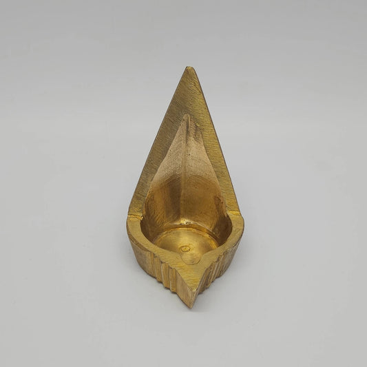 Direct straight front view of the premium solid brass mada vilakku traditional niche diya showcasing the tall triangular backplate and inner oil basin by Sri Swaminathan and Co.