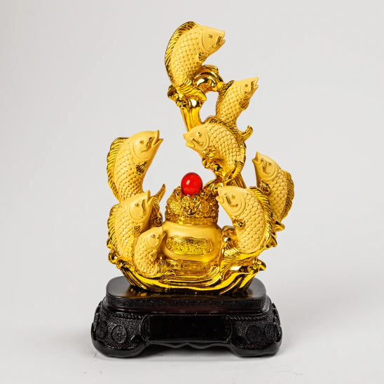 24cm premium royal gold dust finish resin Feng Shui nine carps statue leaping around a central wealth pot with a red gem on a black base by Sri Swaminathan and Co.