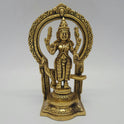 Three-quarter front left perspective view of the six point nine inch brass Kandhan statue demonstrating the thick side lines of the integrated archway casting
