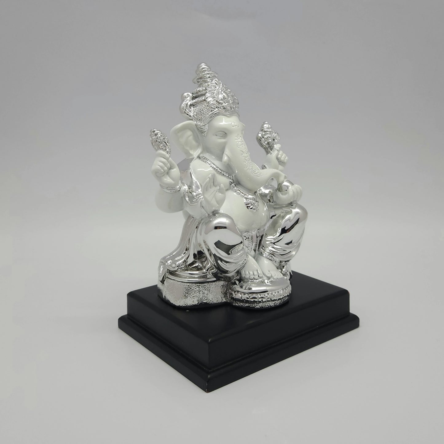 Right perspective view highlighting the detailed silver drapery patterns on the lower garments and the clean white marble-look skin.