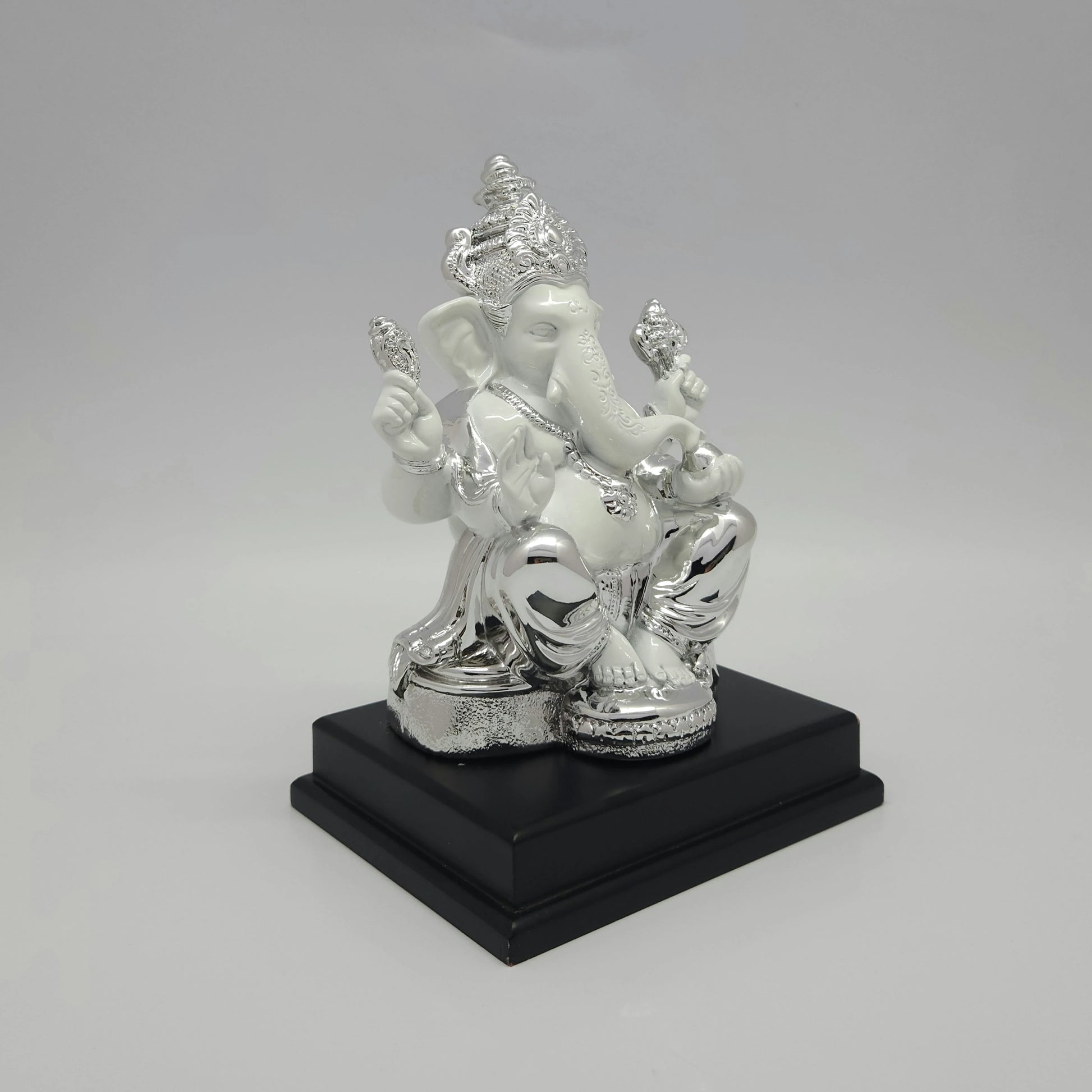 Right perspective view highlighting the detailed silver drapery patterns on the lower garments and the clean white marble-look skin.