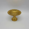 Three-quarter angled view of the heavy 1.050kg brass altar stand showing the inside capacity of the wide shallow basin.