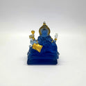 Full back view of the frosted blue glass-look Ganesha statue highlighting the clean gold detailing on his rear halo