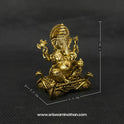 Front perspective measurement photo of the two inch solid brass Ganesha statue next to a scale demonstrating the five centimeter height and compact micro altar dimensions