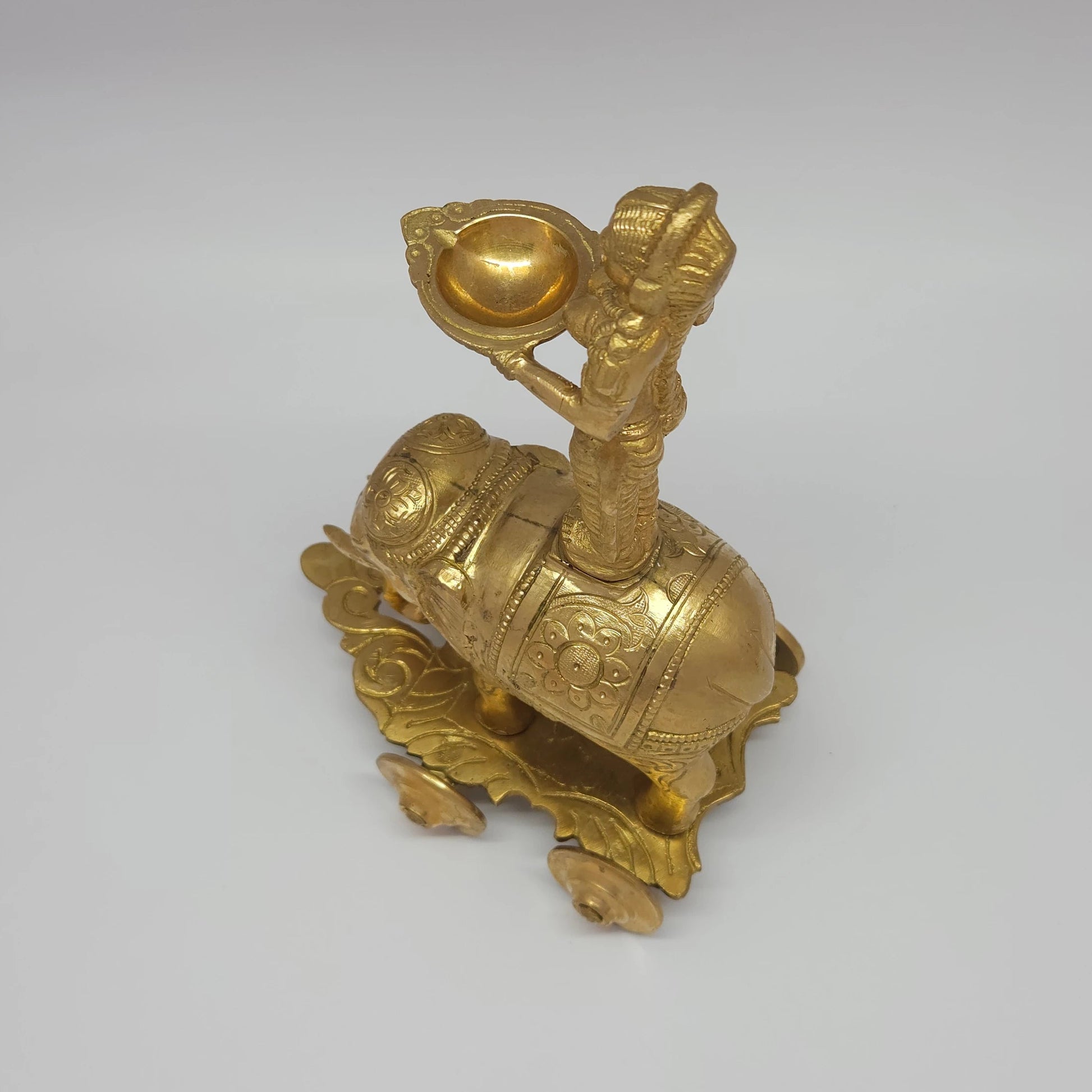 Sri Swaminathan and Co handmade brass Deepalakshmi on elephant chariot lamp 10-inch 26cm height top-down aerial perspective view showing oil bowl capacity