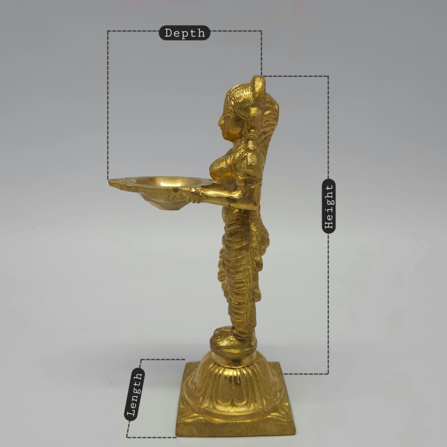 Sri Swaminathan and Co brass Deepalakshmi Pavai Vilakku lamp side posture view facing left side tracking oil bowl projection and base platform depth