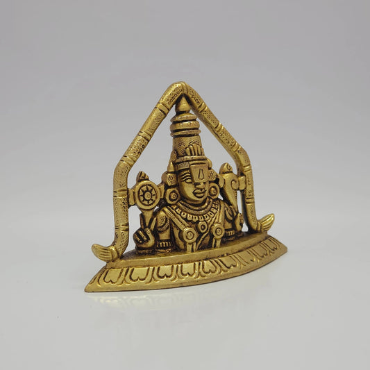 Sri Swaminathan and Co brass Venkateswara Swamy statue antique finish 500g weight 45 degree right pose corner view focusing on chiseled panchajanya conch shell attribute and base depth