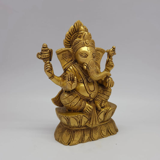 Sri Swaminathan and Co brass Ganesha on lotus pedestal antique finish 1.6kg weight 45 degree right pose corner view focusing on traditional elephant goad tool and mouse details