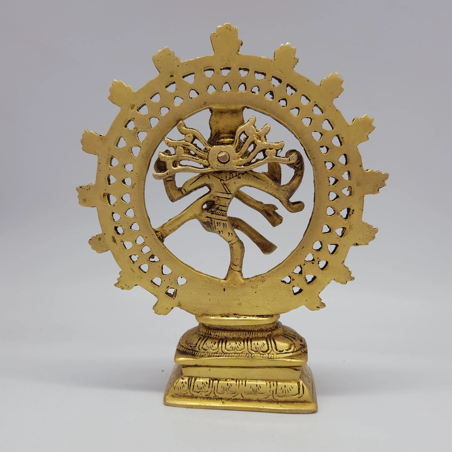 Sri Swaminathan and Co brass Nataraja shiva tandava statue antique finish 1.05kg weight back pose full rear view showing reverse of circular thiruvasi halo arch and rectangular base