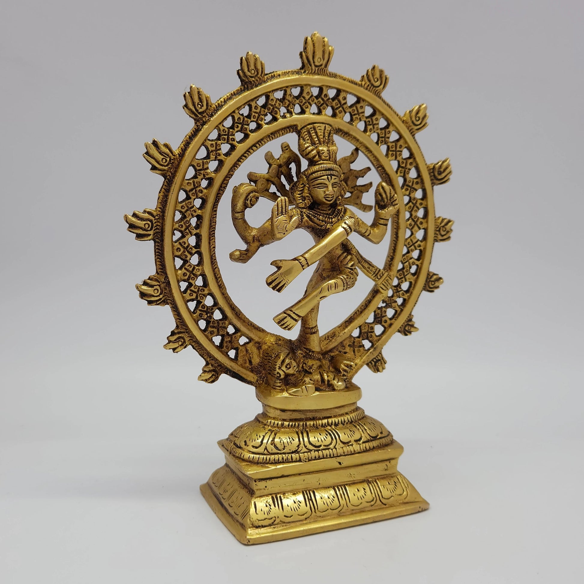 Sri Swaminathan and Co brass Shiva Tandava nataraja statue antique finish 1.05kg weight 45 degree right pose corner view focusing on left hand agni fire and raised gaja hasta leg posture