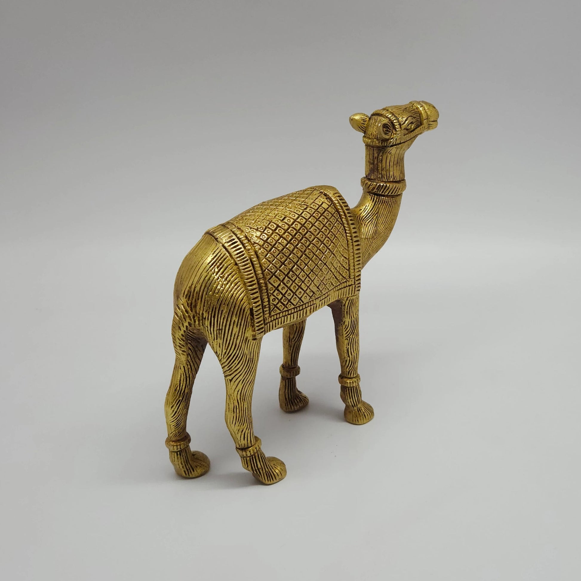 Sri Swaminathan and Co brass standing camel showpiece antique finish 20cm length back pose full rear view showing reverse of tail and back legs layout