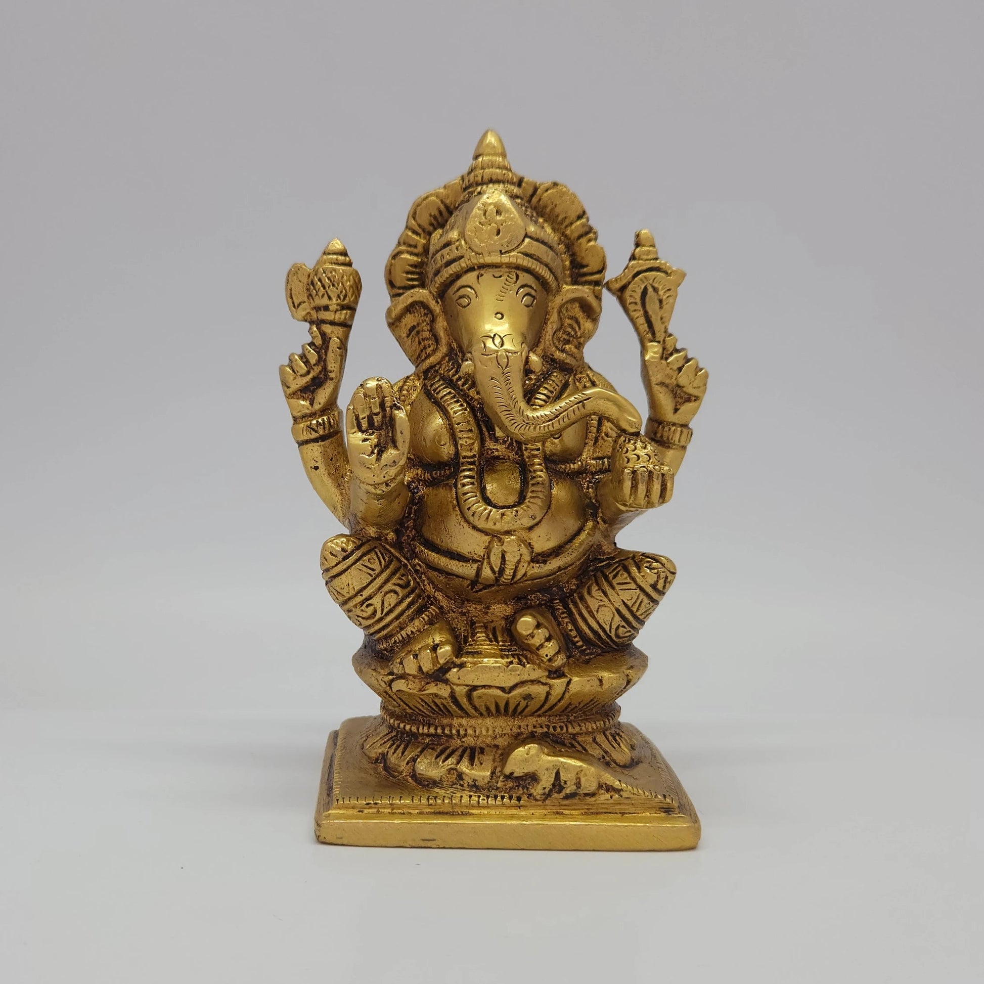 Sri Swaminathan and Co premium solid brass seated Lord Vighnaharta Ganesha statue holding traditional pasha and ankusha tools heritage antique finish 1kg weight 11.5cm height front straight view