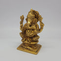 Sri Swaminathan and Co brass Lambodara Vinayaka statue antique finish 1kg weight 45 degree left pose corner view highlighting chiseled pasha noose attribute and ear profiles
